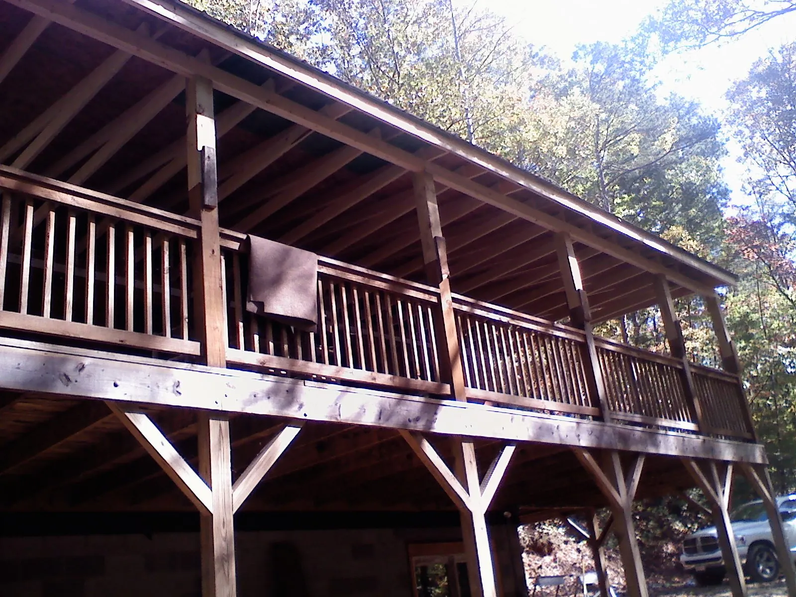 Timber framing under a new elevated porch and deck — Roof Leak Repair in Bolivar by Roofing Brothers